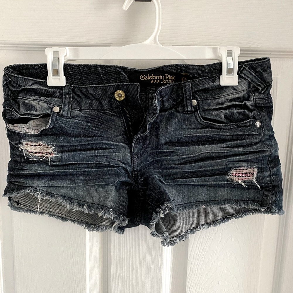 Distressed embellished jean shorts